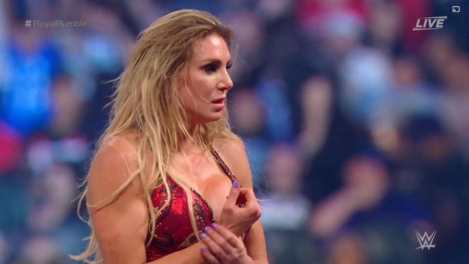 WATCH: Charlotte Flair busts open and bleeds during a live event