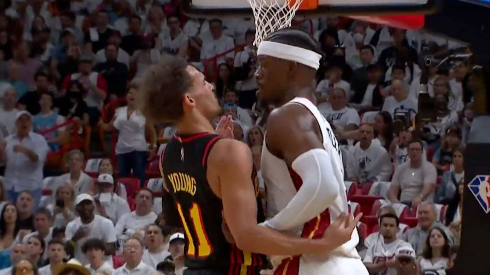 “Watch yourself! This is MIAMI HEAT!” Jimmy Butler grabs Trae Young by his neck during a heated exchange in Game 1