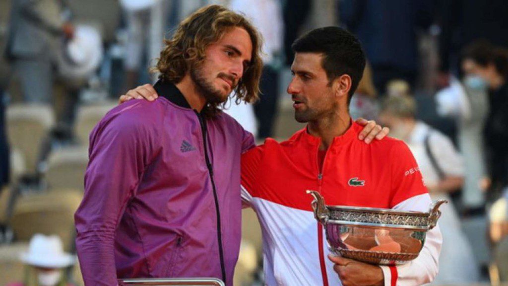 Stefanos Tsitsipas and Novak Djokovic after the 2021 French Open finals