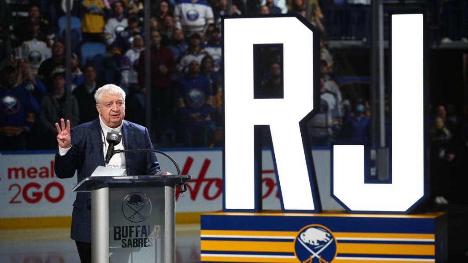 “RJ, RJ, RJ” the crowd shouted out as Buffalo Sabres rose the banner honouring longtime broadcaster Rick Jeanneret