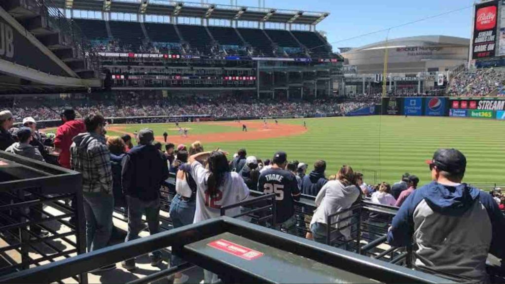 fan runs away from foul ball