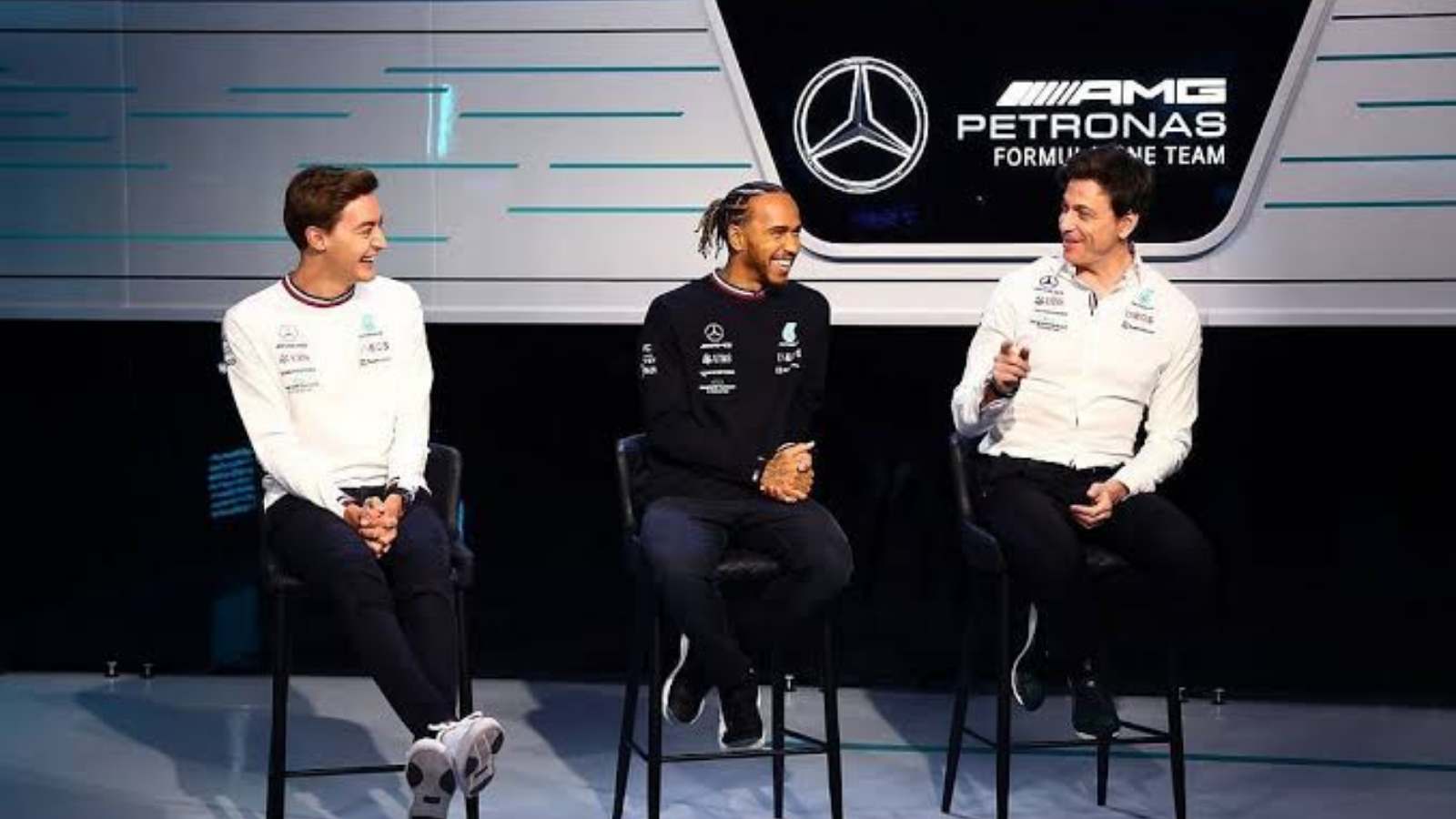 Lewis Hamilton, George Russell and Toto Wolff