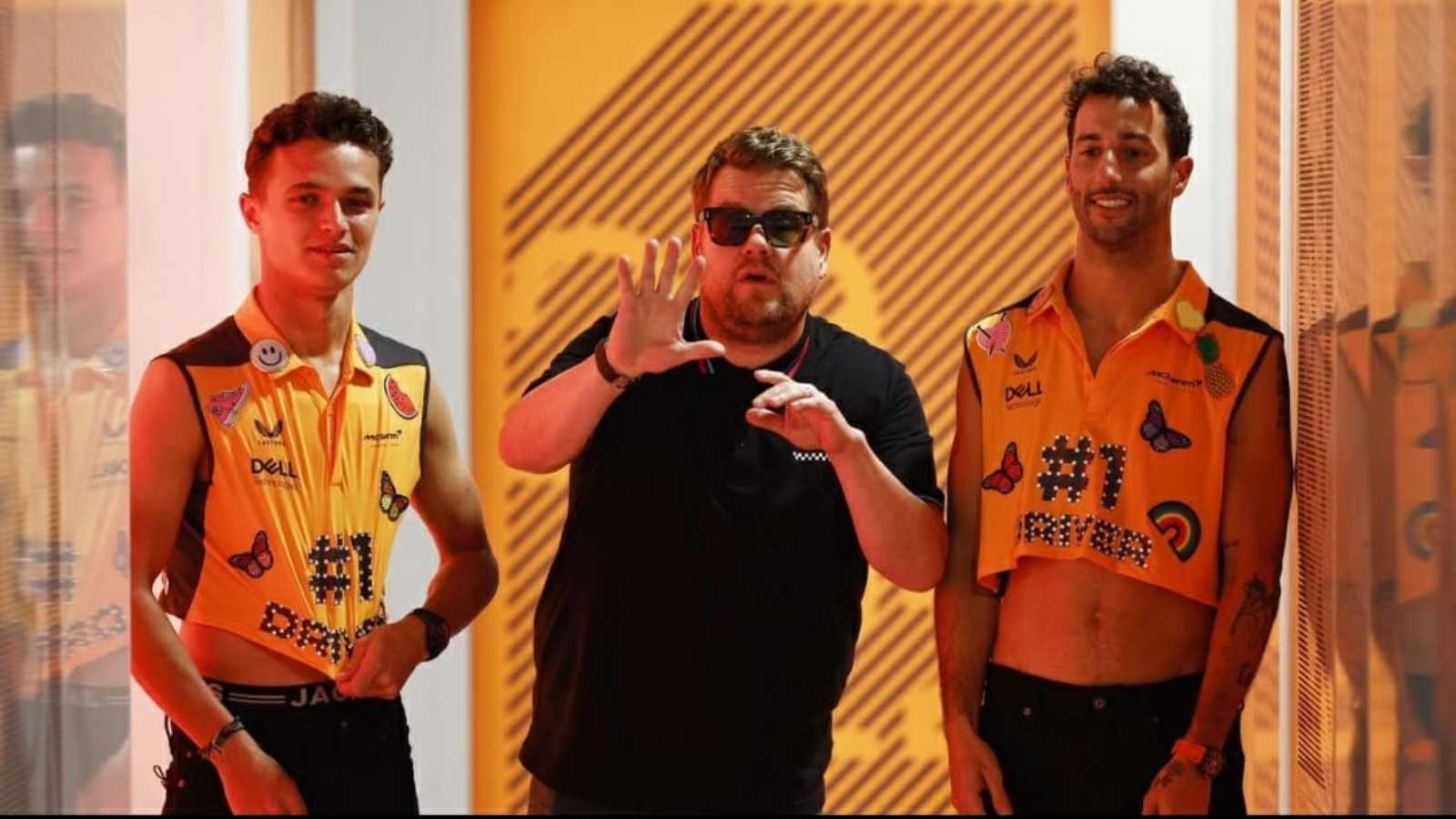 Daniel Ricciardo and Lando Norris giving 80’s pop stars a run for their money with their eye catching entry alongside James Corden