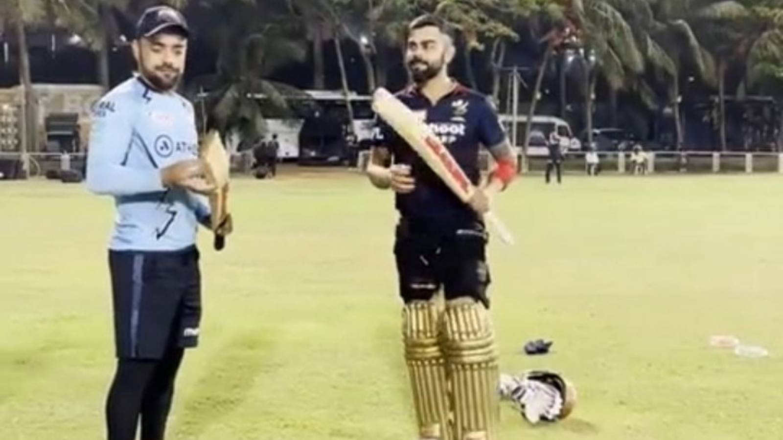 [Watch] –  Rashid Khan delighted as Virat Kohli gifts him his bat ahead of RCB’s crucial tie against GT