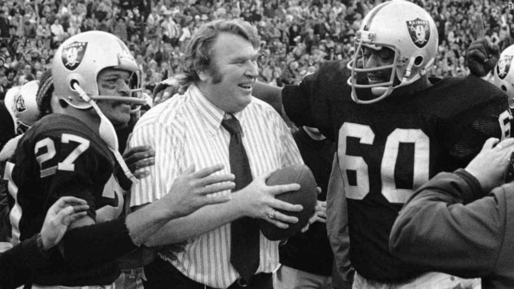 John Madden as the head coach of the Oakland Raiders