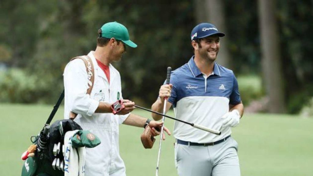 Jon Rahm with his caddie Adam Hayes