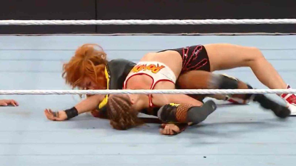 Ronda rousey and becky lynch in the ring