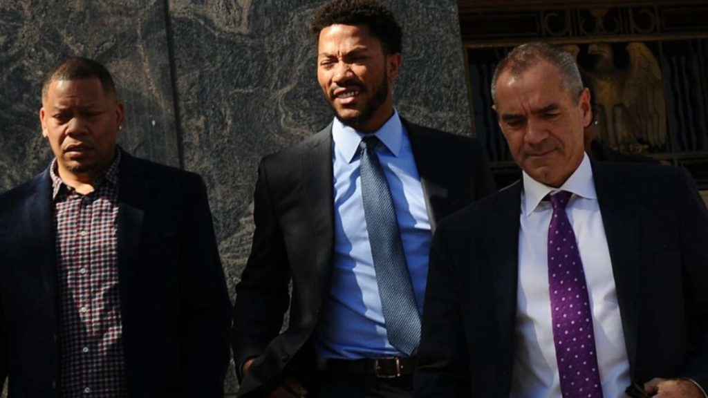 Derrick Rose with his lawyers