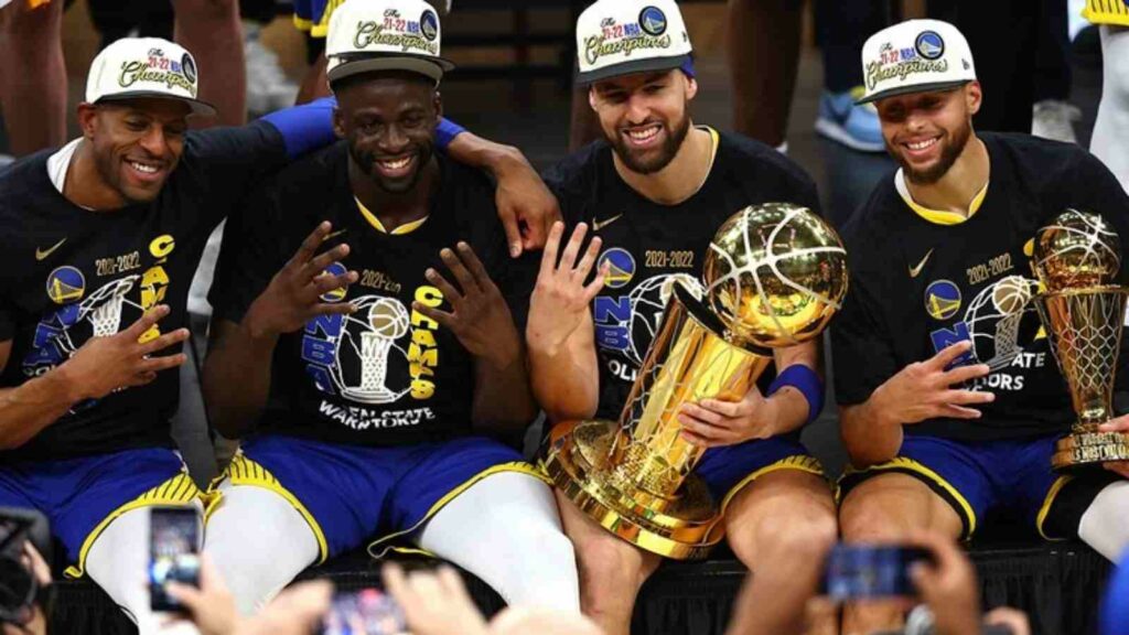 Andre Iguodala, Draymond Green, Klay Thompson and Stephen Curry with the NBA Title