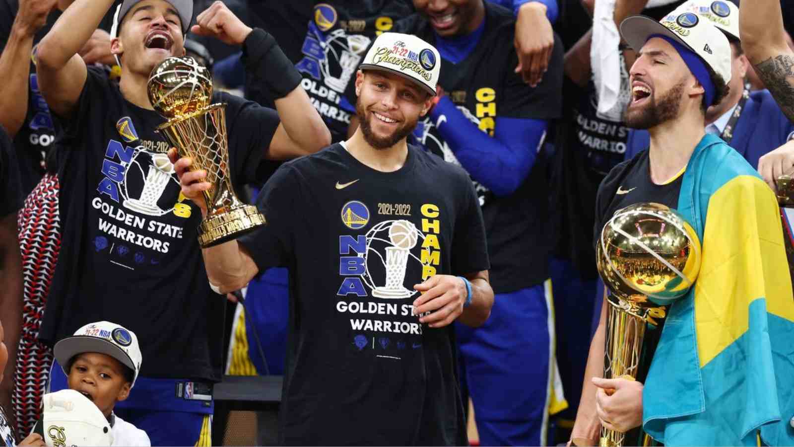 Stephen Curry with the FMVP Trophy