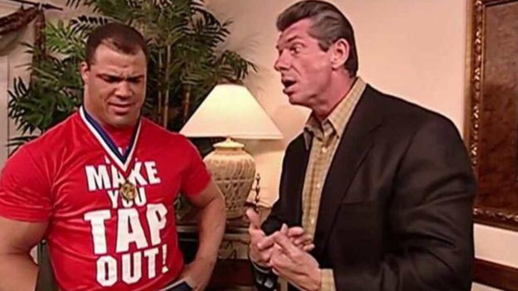 Kurt Angle talks with Vince McMahon 