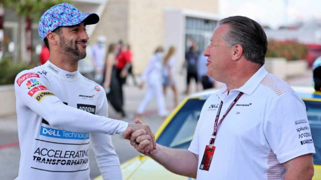 Daniel Ricciardo (L) and Zak Brown (R)