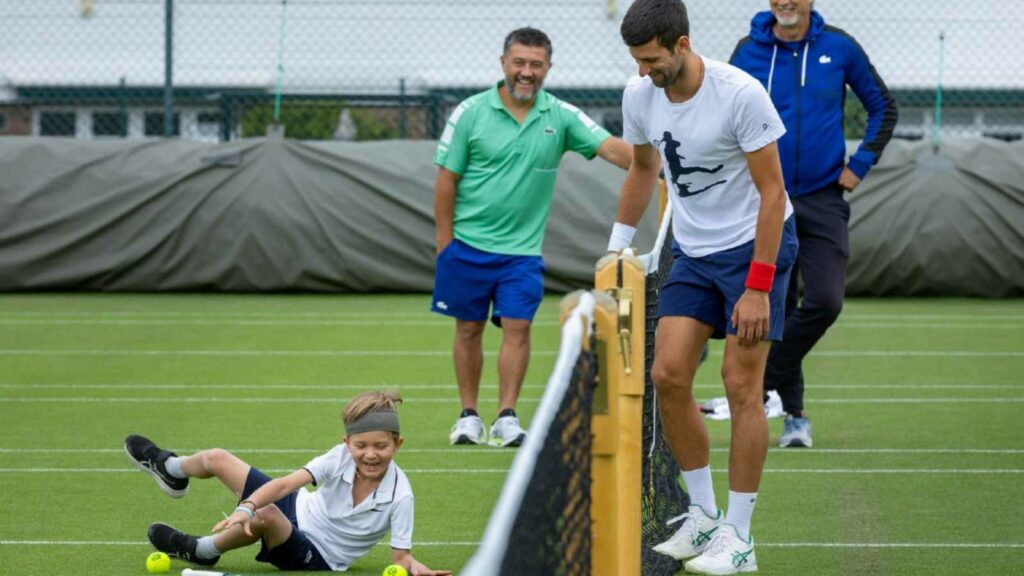 Novak Djokovic with his son and team