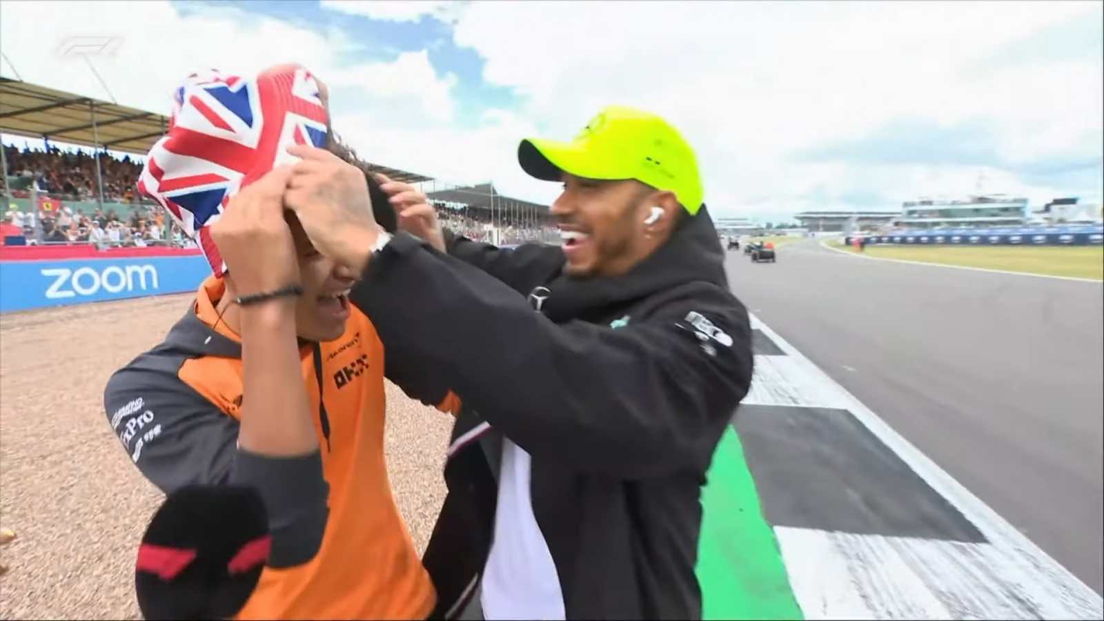 WATCH: Lando Norris and Lewis Hamilton joke around in front of home fans before the British GP