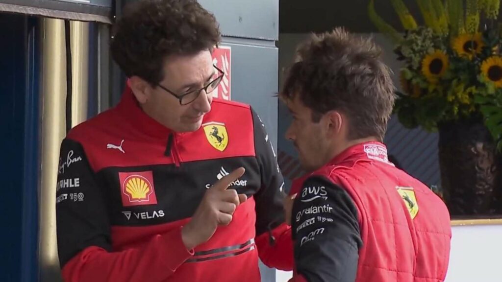 Ferrari's Mattia Binotto and Charles Leclerc