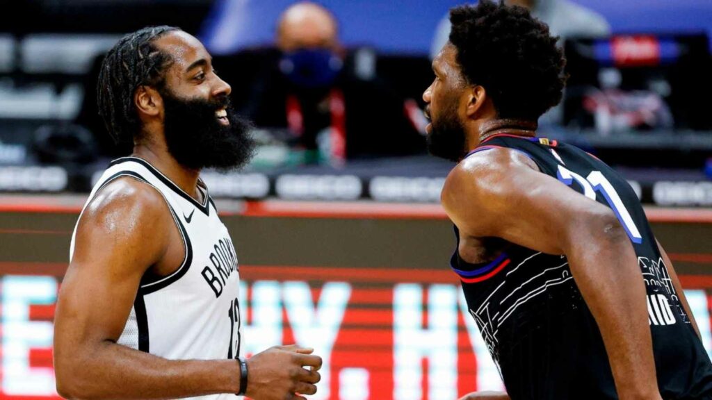 James Harden and Joel Embiid at a Nets vs 76ers matchup in 2021