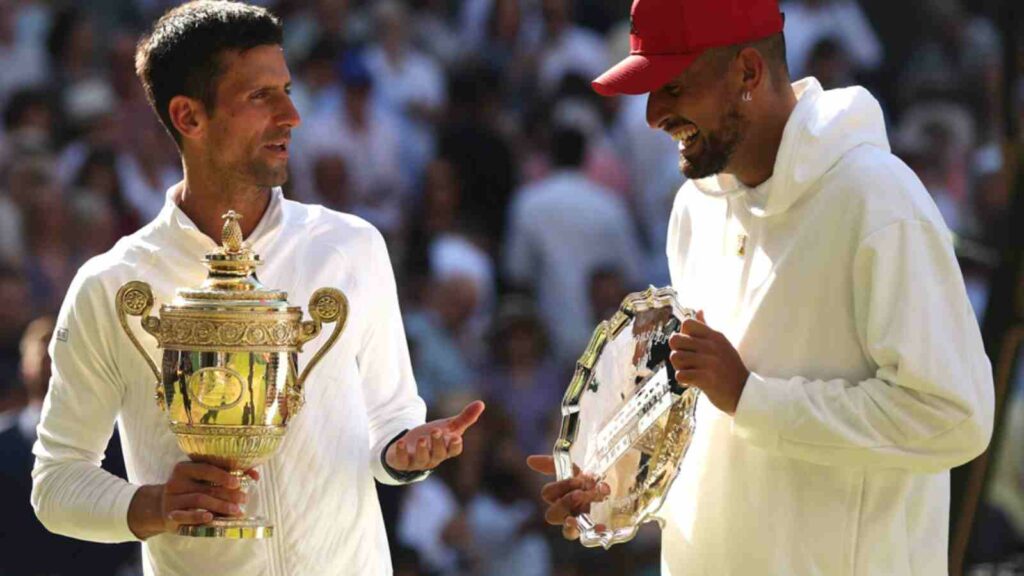 Novak Djokovic and Nick Kyrgios with their trophies at the Wimbledon 2022