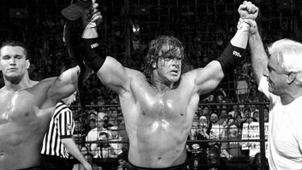 Randy Orton with Triple H and Ric Flair after the conclusion of the match.