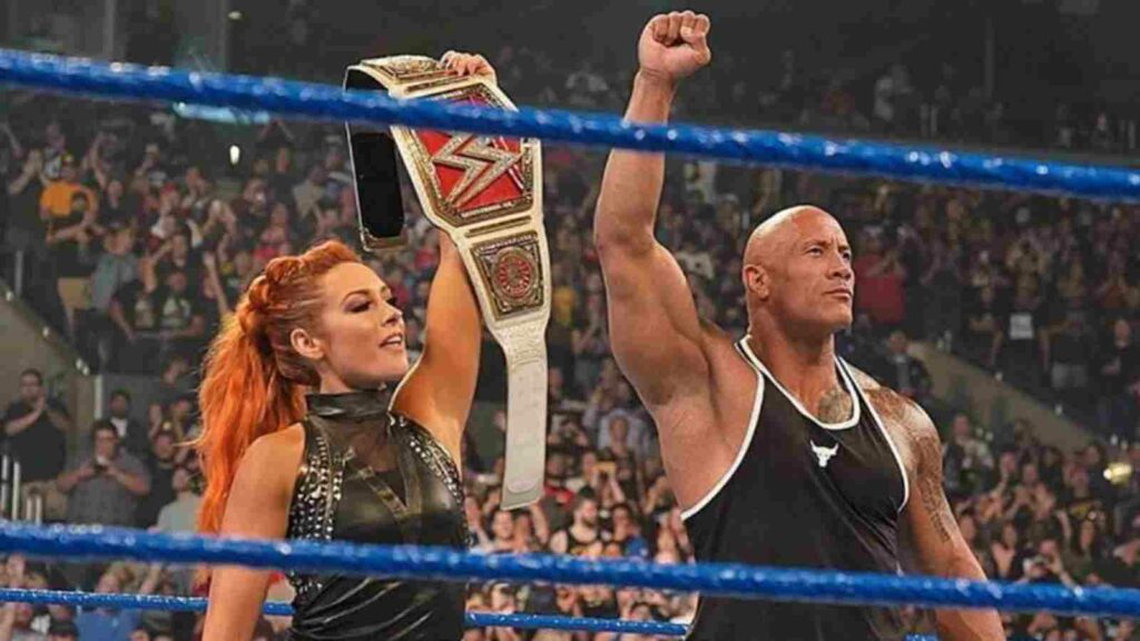 Becky Lynch and The Rock at the 20th anniversary episode of SmackDown