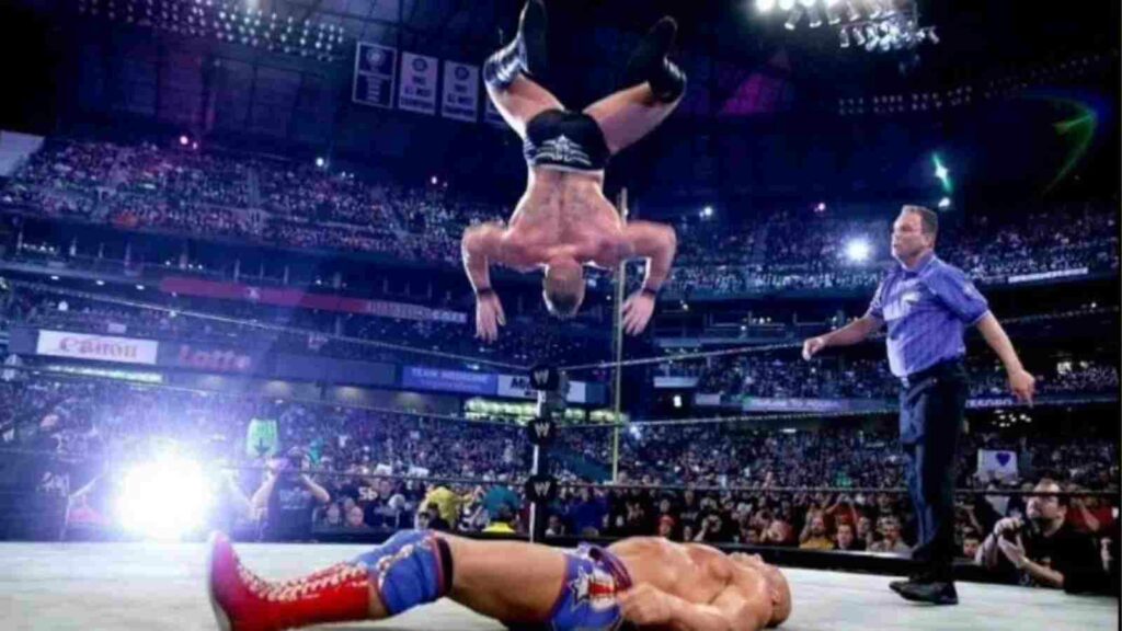  Brock Lesnar vs Kurt Angle at WrestleMania 19, 2003. Brock performing the Shooting Star press