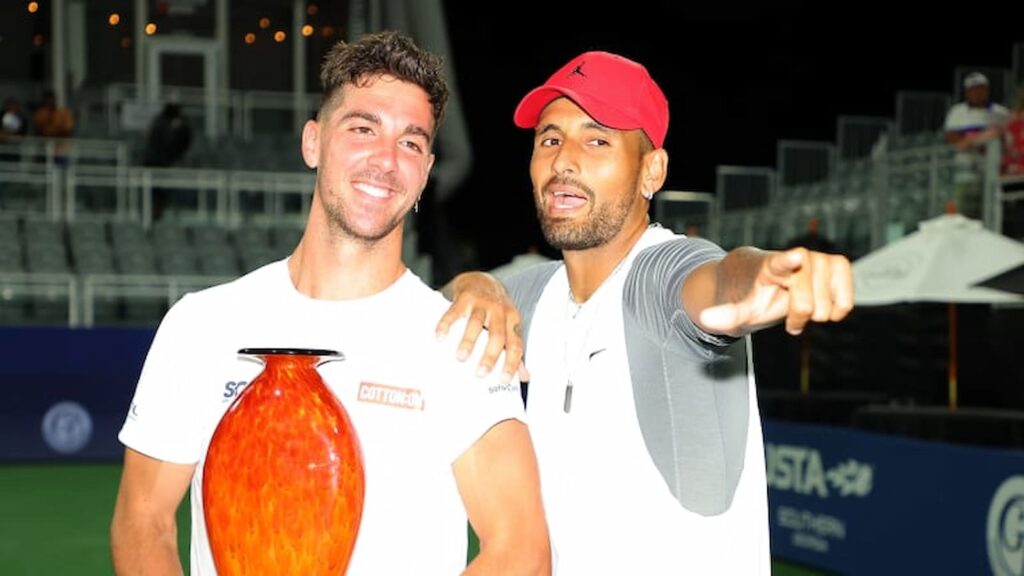 Thanasi Kokkinakis and Nick Kyrgios posing with the 2022 Atlanta Open trophy