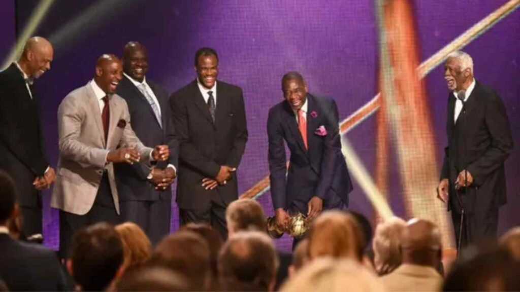 Kareem Abdul-Jabbar, Alonzo Mourning, Shaquille O'Neal, David Robinson and Dikembe Mutombo with Bill Russell