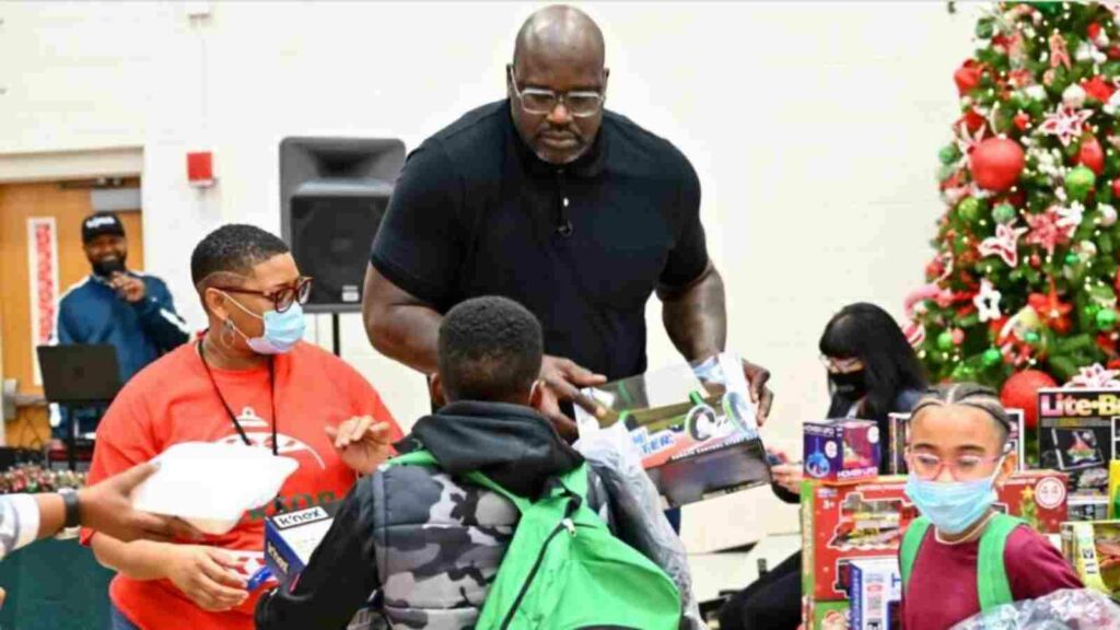 Shaquille O'Neal helping the kids