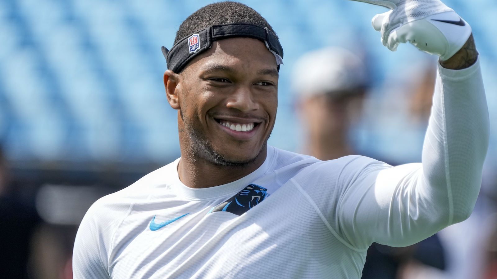 “We’re at a family function,” DJ Moore intervenes and breaks up fan fight in the stands during Carolina Panthers’ fan fest