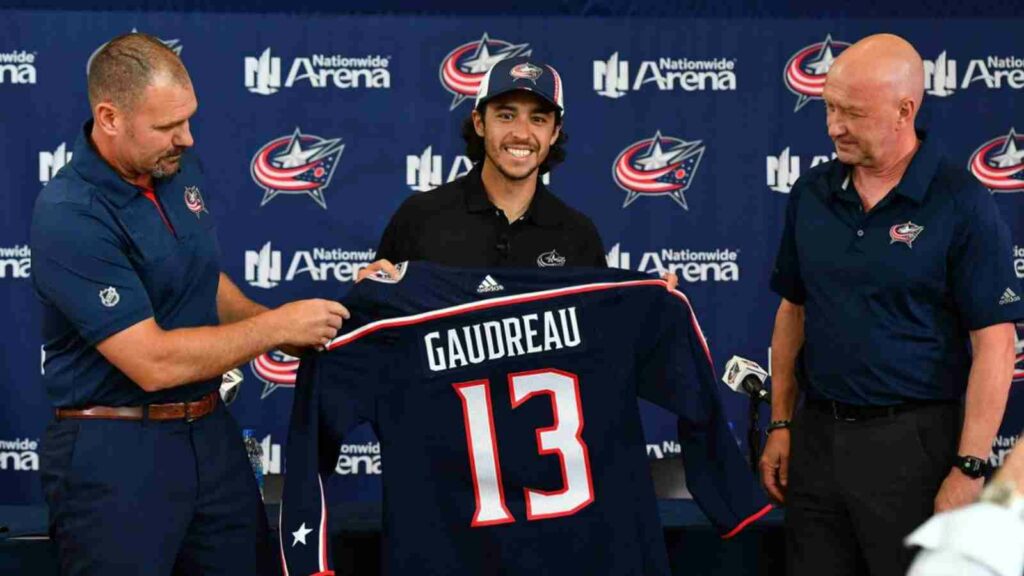 Johnny Gaudreau with coach Brad Larsen