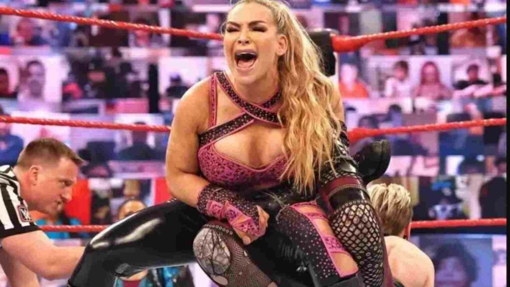 Natalya applying the Sharpshooter on her opponent