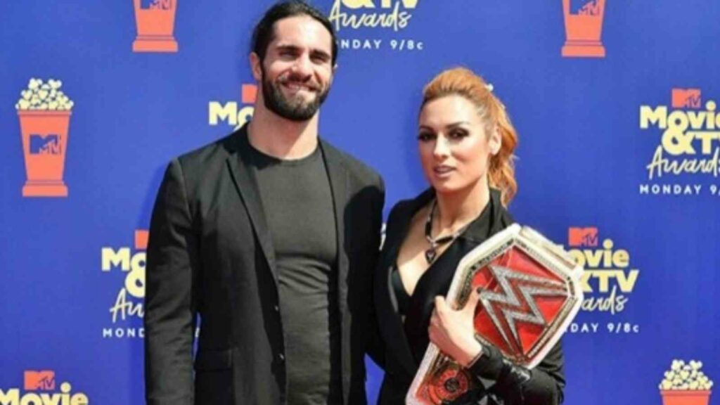 Seth Rollins and Becky Lunch at a red carpet event of a movie.