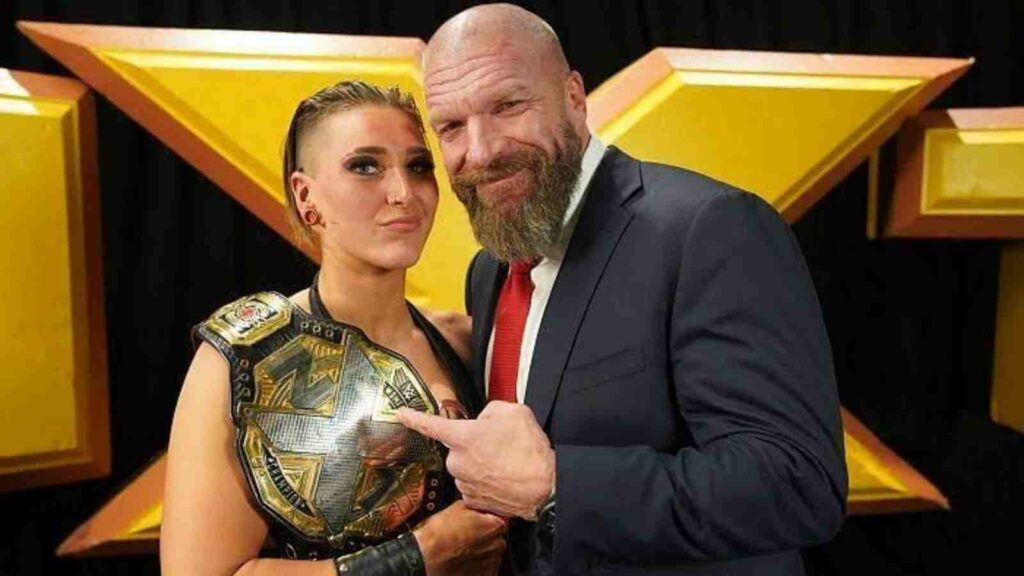 Rhea Ripley and Triple H 