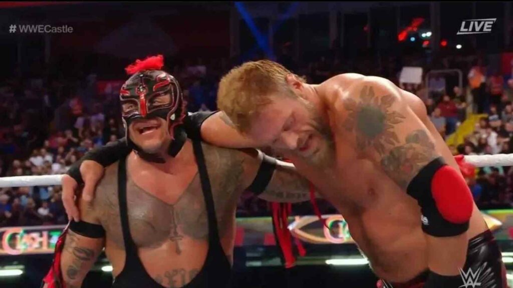 Edge and Rey Mysterio after the match