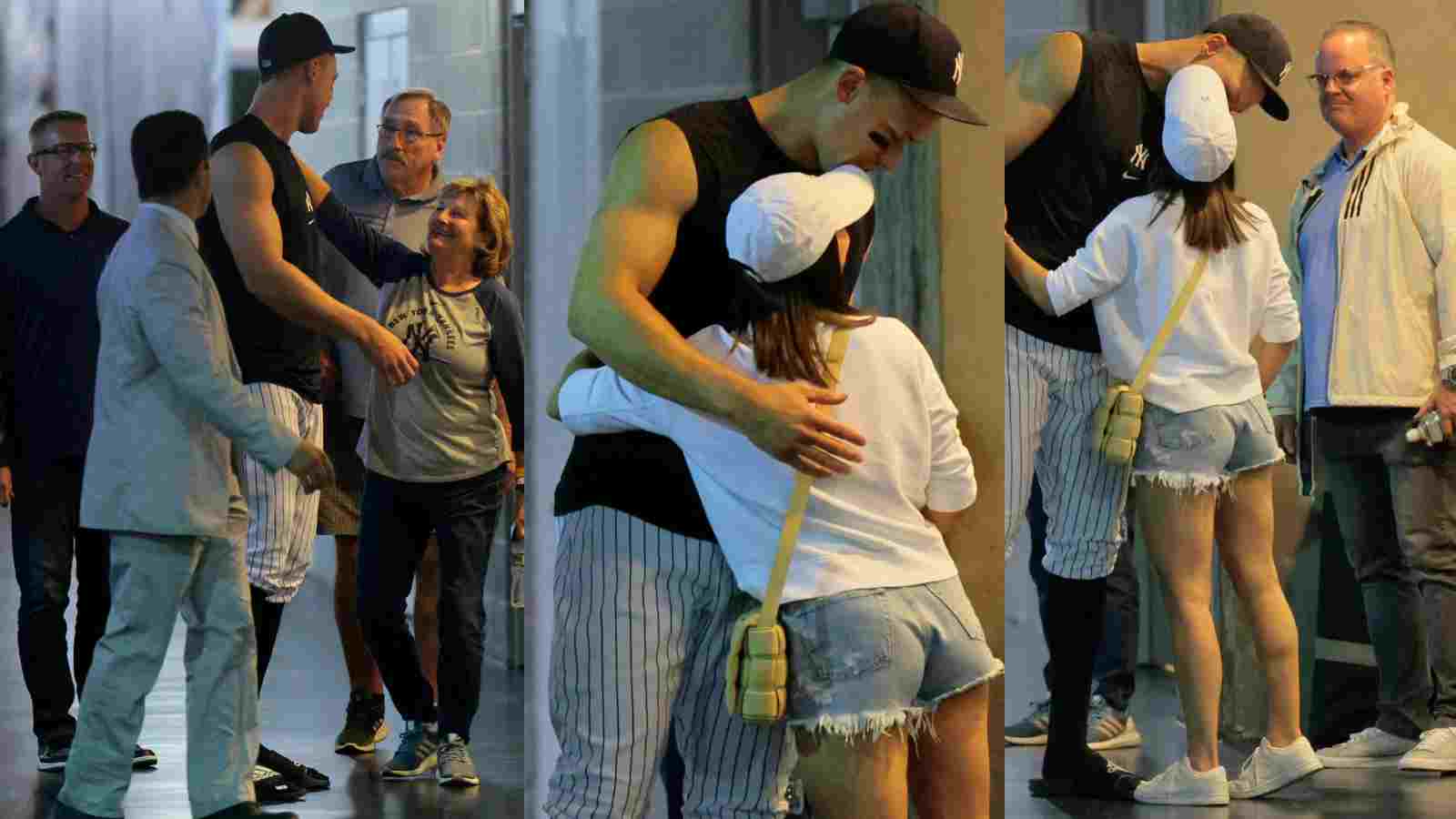 Aaron Judge having a cozy and affectionate moment with wife, Samantha Bracksieck, after tying Babe Ruth for 60 HR record