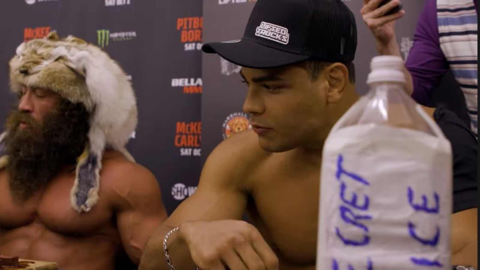 WATCH: Paulo Costa rips shirt, flexes muscles, and gets destroyed by controversial Liver King in “disgusting” eating contest