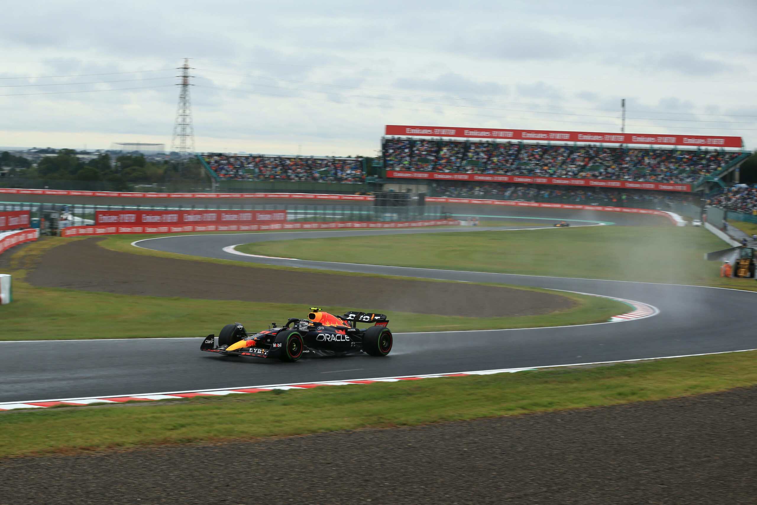 Which racer has the most number of victories at the Japanese Grand Prix?