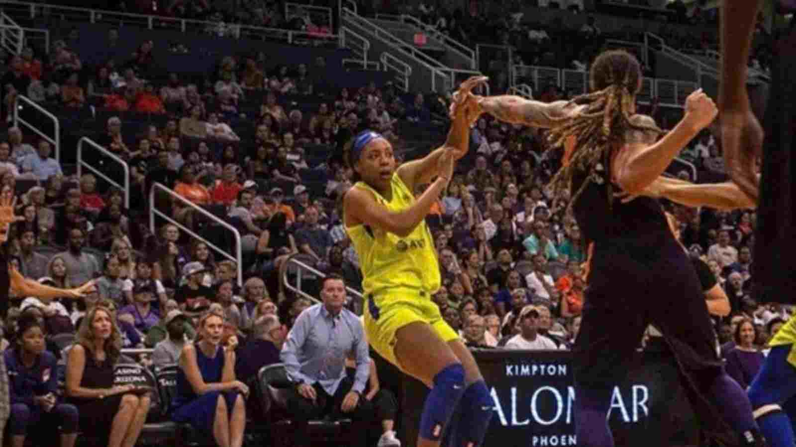 Kristine Anigwe getting punched by Brittney Griner