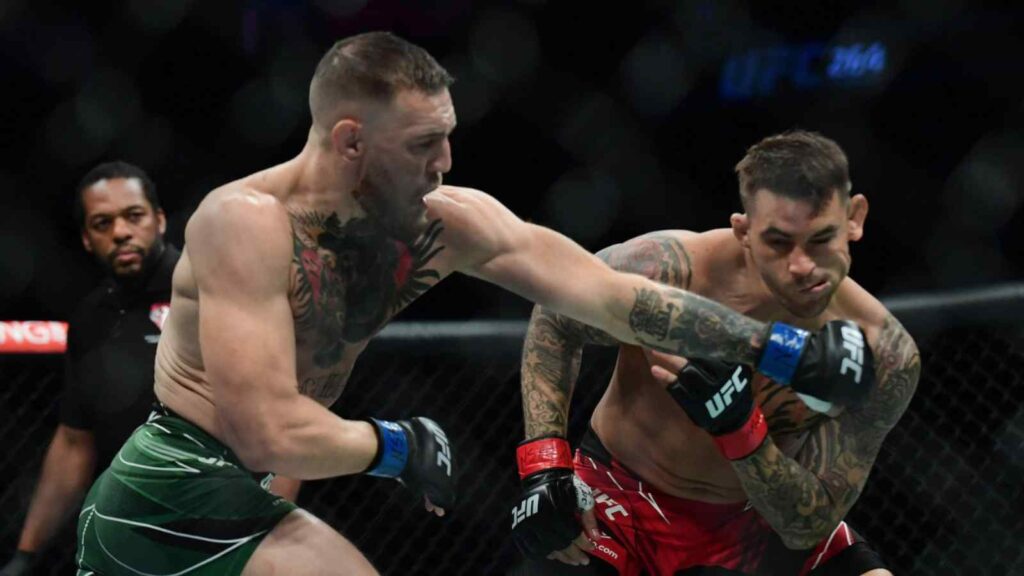 Conor McGregor (L) in action against Dustin Poirier (R)