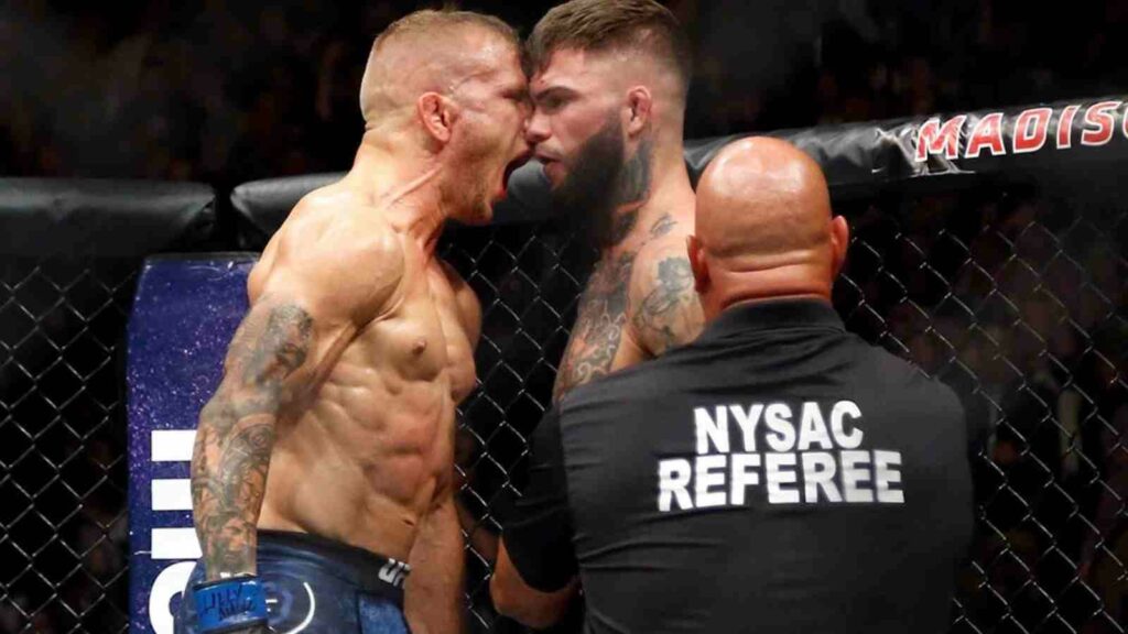 TJ Dillashaw (L) gets in Cody Garbrandt's (R) face after beating him.