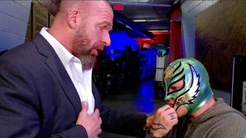 Triple H talks Rey Mysterio at the backstage