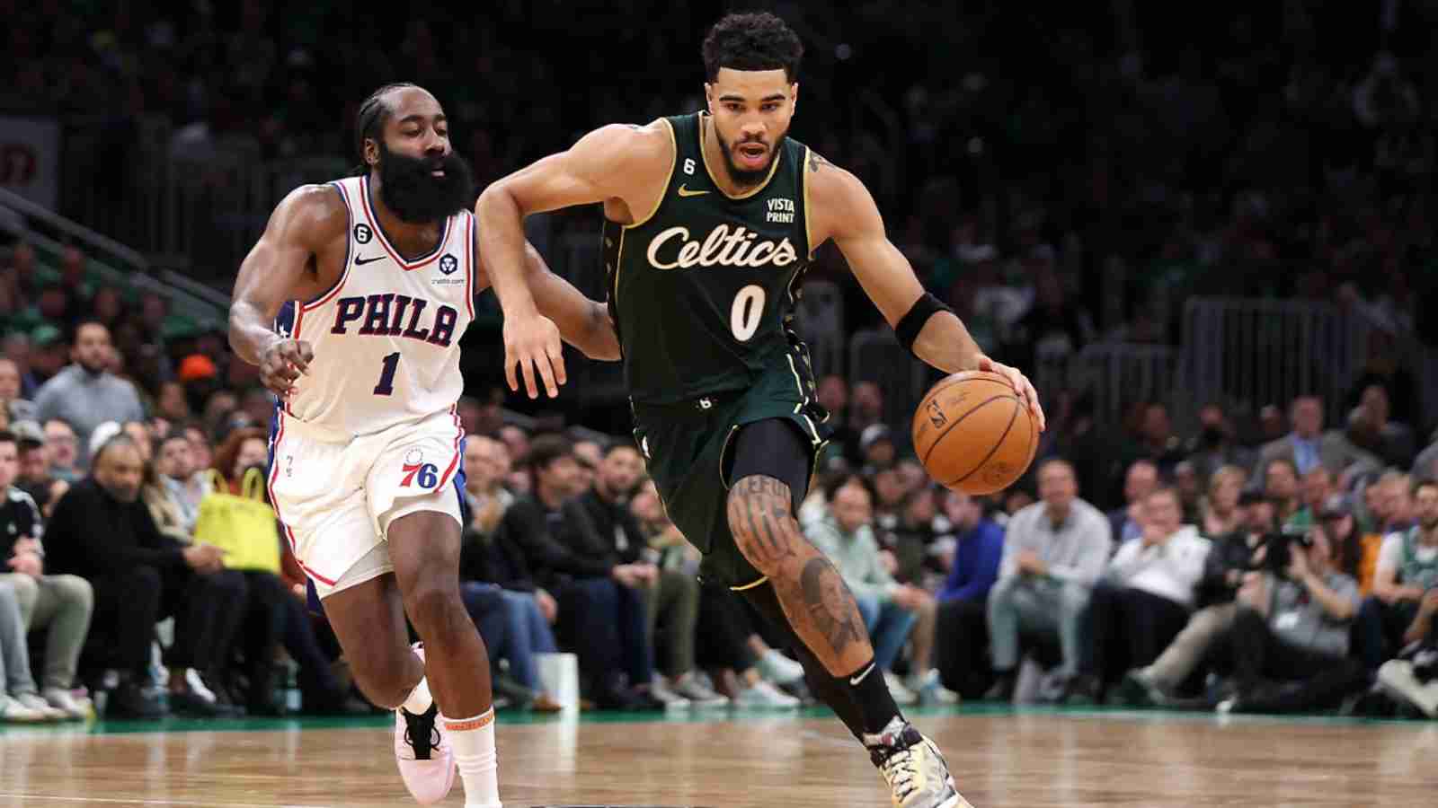 Jayson Tatum(0) goes past James Harden(1) in today's matchup