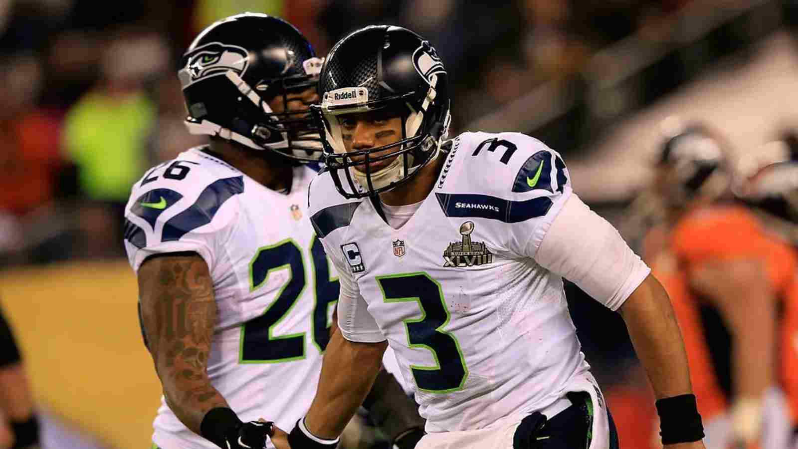 “My 13 year old son understands football better” Ex NFL fullback Michael Robinson brutally hits back at former teammate Russell Wilson for his deadbeat attitude with the Broncos