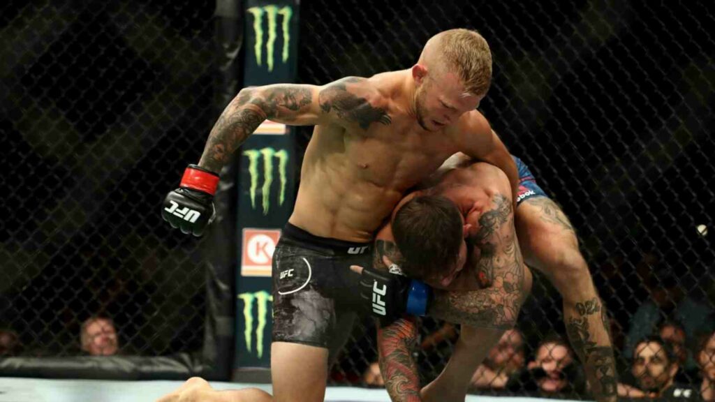 TJ Dillashaw (on top) finishes Cody Garbrandt for the second time