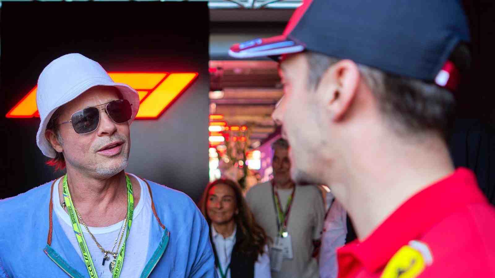 “I wanna see Charles Leclerc in a movie with him”: Fans go crazy with their imaginations as Brad Pitt visits the Ferrari garage ahead of United States GP