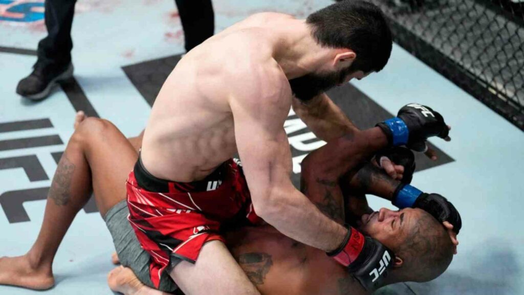 Islam Makhachev (on top) mauls Bobby Green en route to a TKO victory