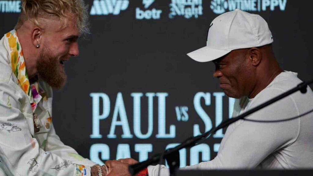 Jake Paul and Anderson Silva (L-R) shake on their bet prior to their fight