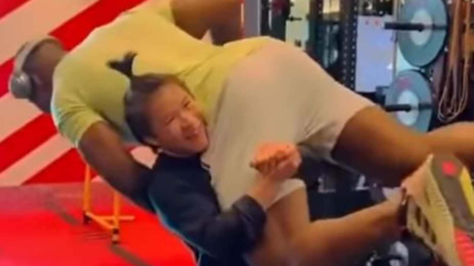 “Don’t think Francis is that heavy”- Zhang Weili SHOCKINGLY reacts to the video of her lifting Francis Ngannou effortlessly