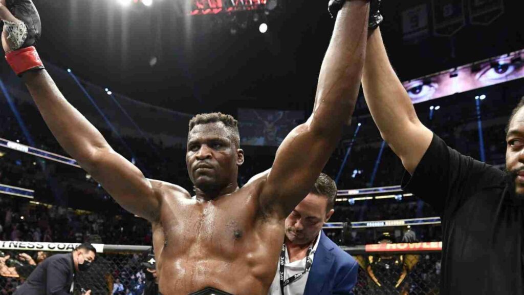 Francis Ngannou (C) is crowned the heavyweight champion of the world, but, not by Dana White.