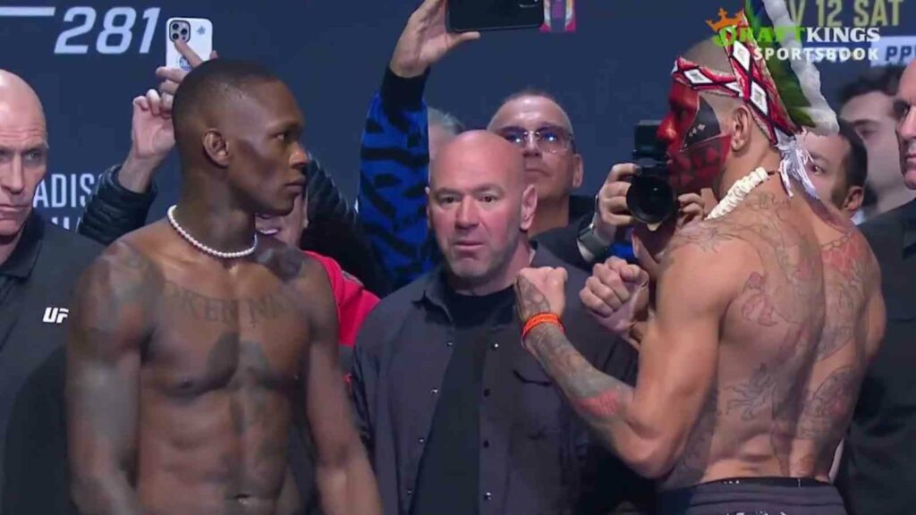 Israel Adesanya (L) and Alex Pereira (R) face-off before their UFC 281 fight