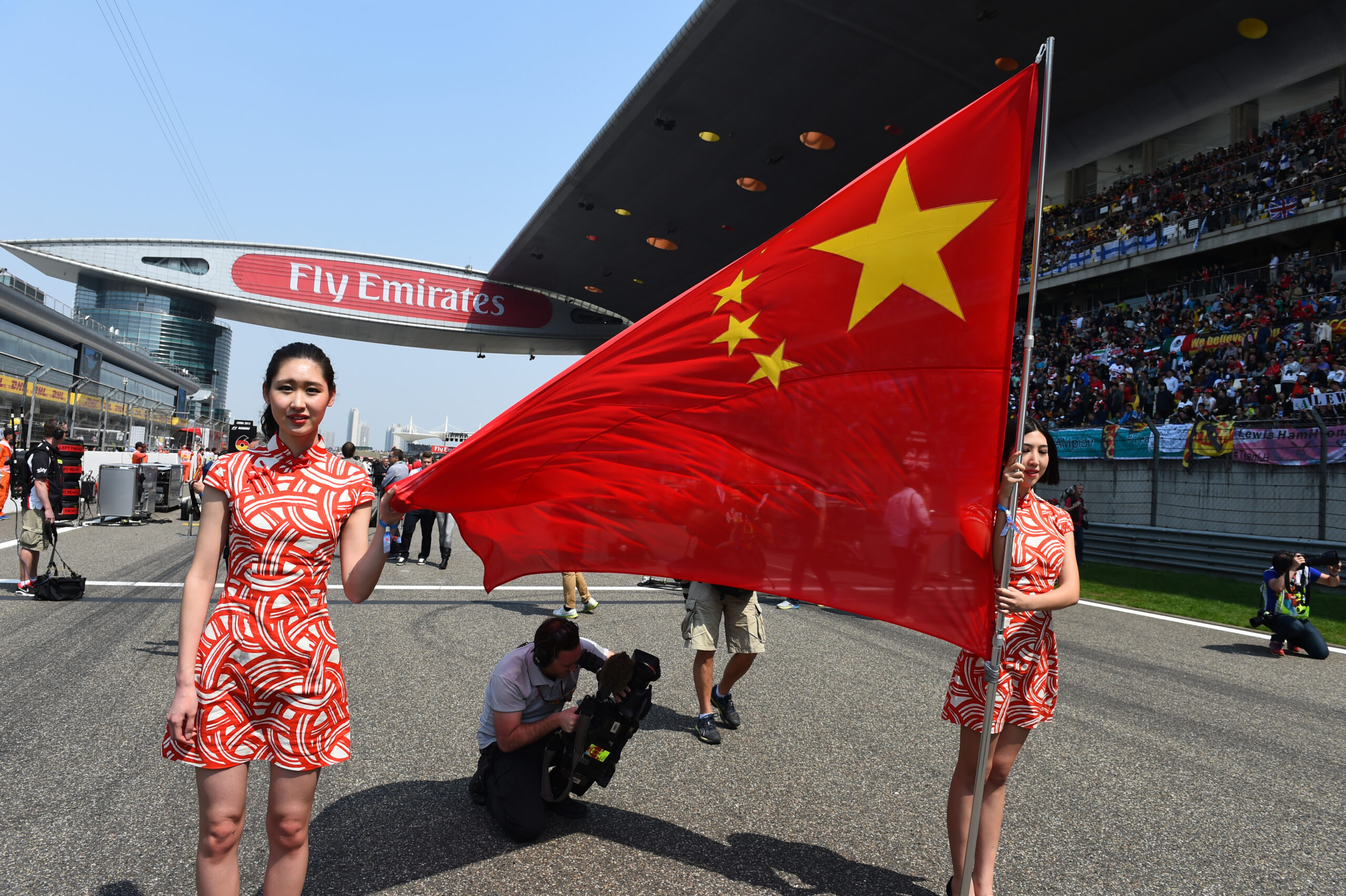 Chinese flag being held by the grid girls at the Chinese Grand Prix, Race, Shanghai, China, Sunday 12 April 2015